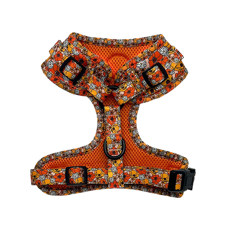 back of dog harness with orange flowers