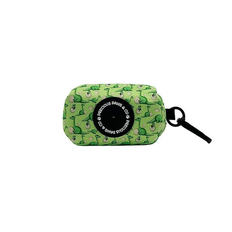 dog waste bag with green dinosaurs