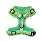 back of dog harness with green dinosaurs