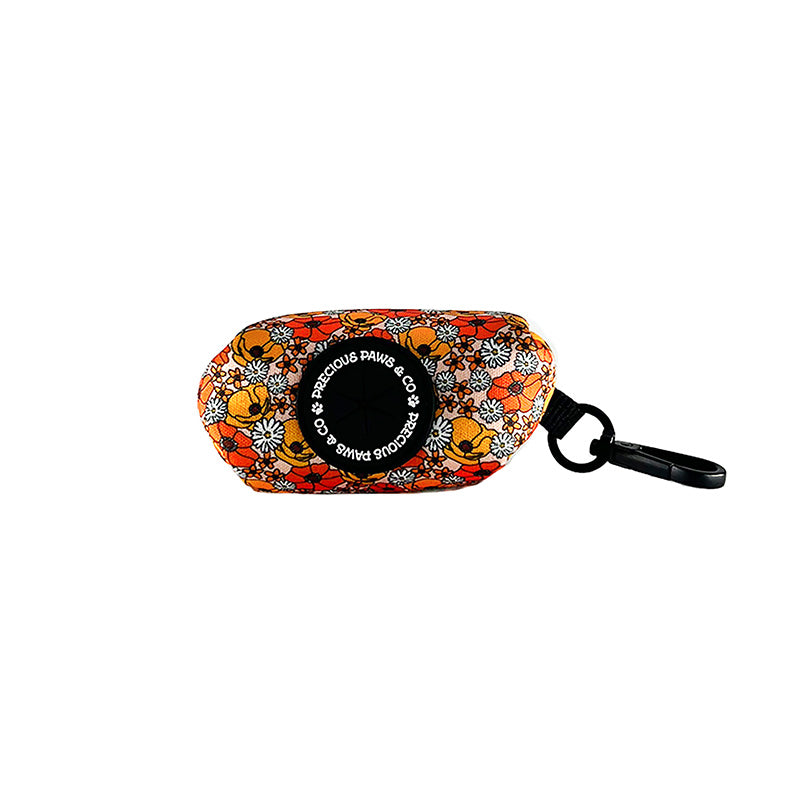 dog waste bag dispenser with orange flowers
